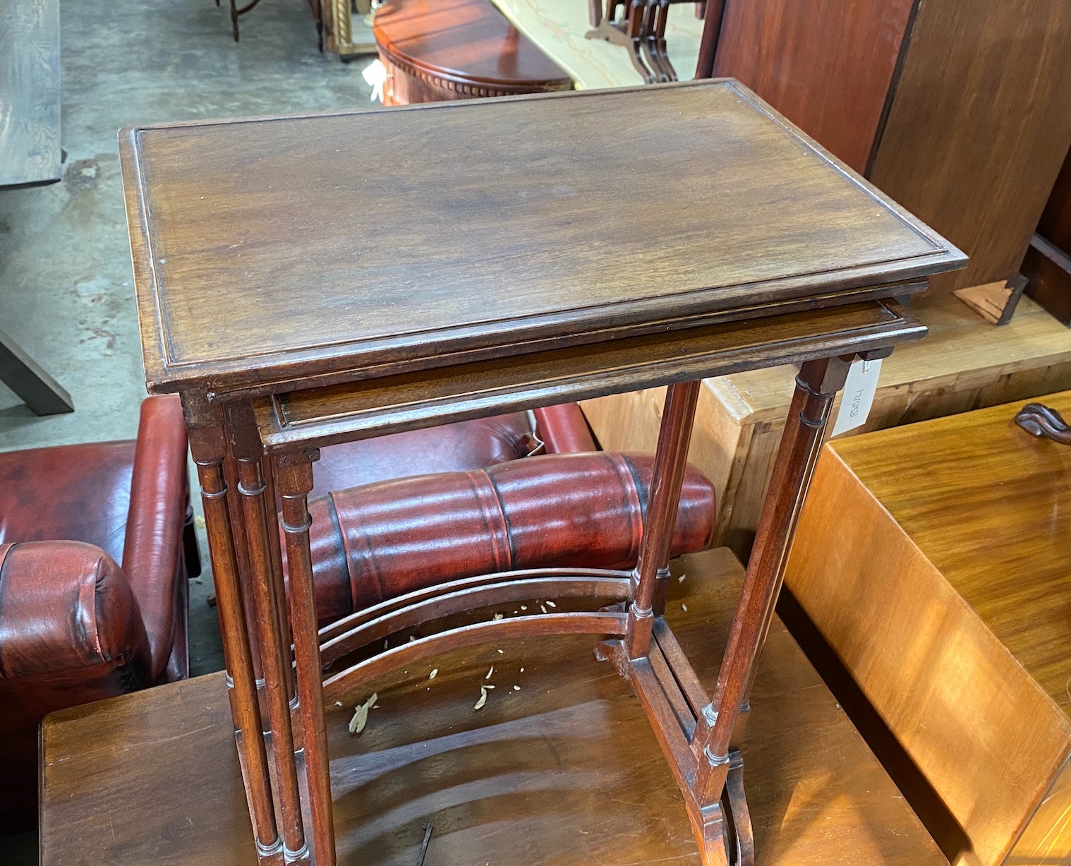 A nest of three Edwardian rectangular mahogany tea tables, width 51cm, depth 32cm, height 72cm